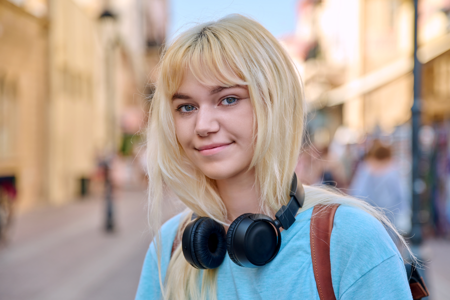 Professional ghost blonde hair color application showing natural, sun-kissed results