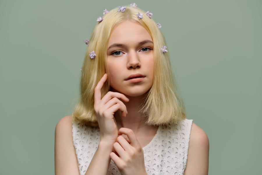 Young woman with trendy short blonde hair