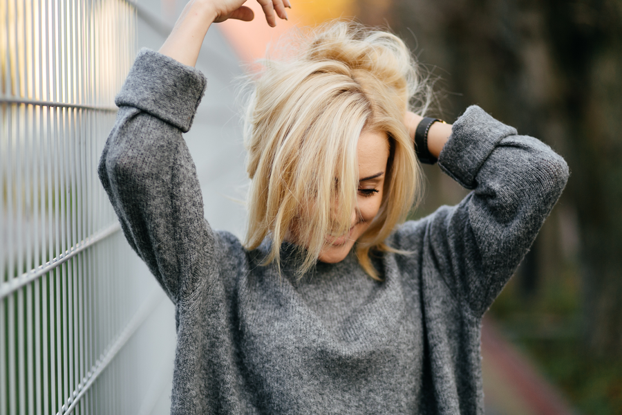 Beautiful blonde hair girl showcasing feminine styling techniques and gorgeous blonde looks