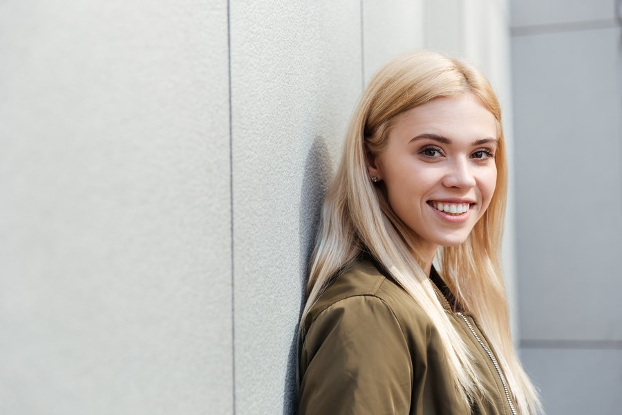 Beautiful woman with stunning platinum hair color showcasing the ultimate blonde transformation